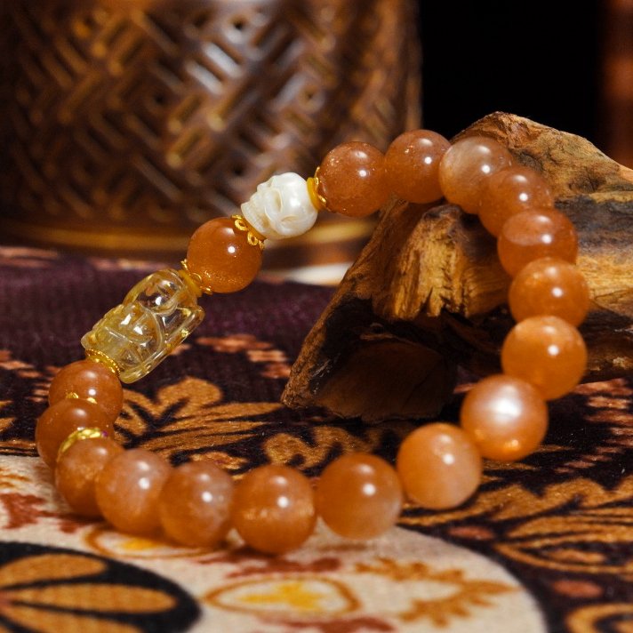 Buddha-Inspired Orange Moonstone & Golden Rutilated Quartz Bracelet – Natural Crystals for Confidence & Clarity