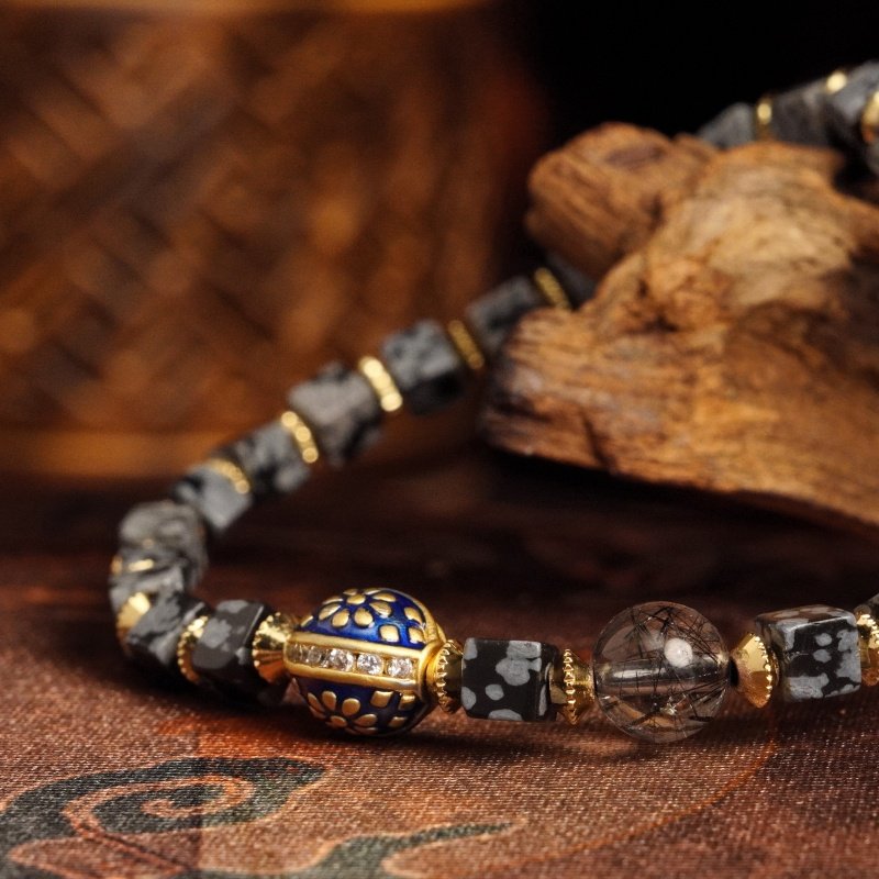 Groxiara Snowflake Obsidian & Black Rutilated Quartz Bracelet – Blue Enamel Gold Accent