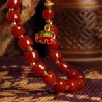 Buddha-Inspired Southern Red Agate Bracelet with Fortune Elephant Pendant