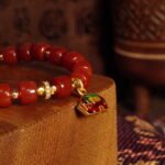 Buddha-Inspired Southern Red Agate Bracelet with Fortune Elephant Pendant