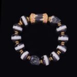 One-Line Dzi & Black Skull Bracelet – Warrior Focus & Mystic Defense
