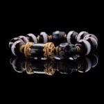 One-Line Dzi & Black Skull Bracelet – Warrior Focus & Mystic Defense