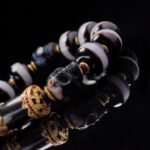 One-Line Dzi & Black Skull Bracelet – Warrior Focus & Mystic Defense