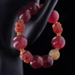 Strawberry Quartz & Golden Rutilated Skull Bracelet – Love, Wealth & Protection