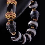 One-Line Dzi & Black Skull Bracelet – Warrior Focus & Mystic Defense