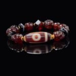 Red Agate Skull & Dzi Bead Bracelet – Protection, Power & Spiritual Awakening
