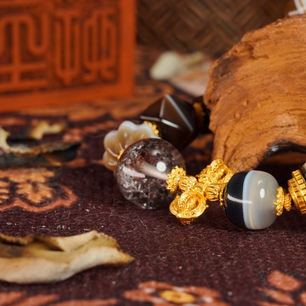 Dzi Bead & Skull Guardian Bracelet with Ruby Gold Accents – Protection, Wisdom & Sacred Power