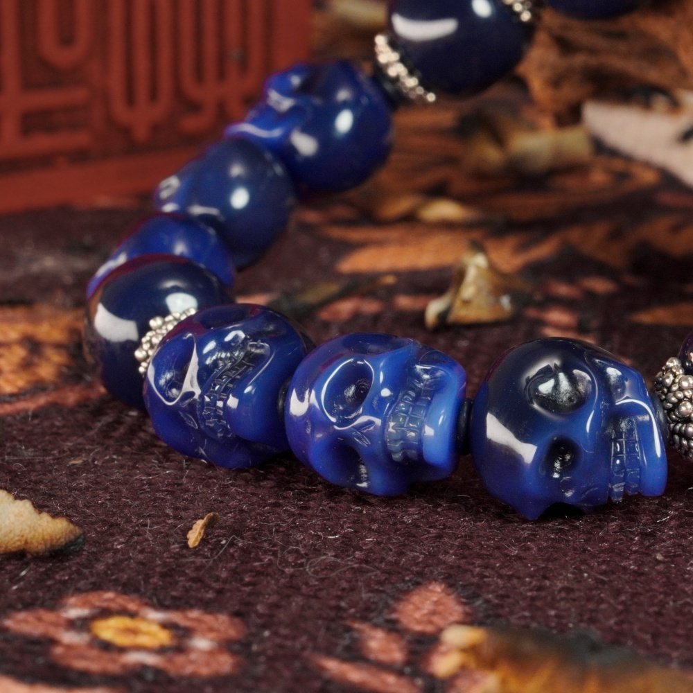 Blue Agate Skull & Black-White Dzi Bead Bracelet – Protection, Courage & Spiritual Awareness