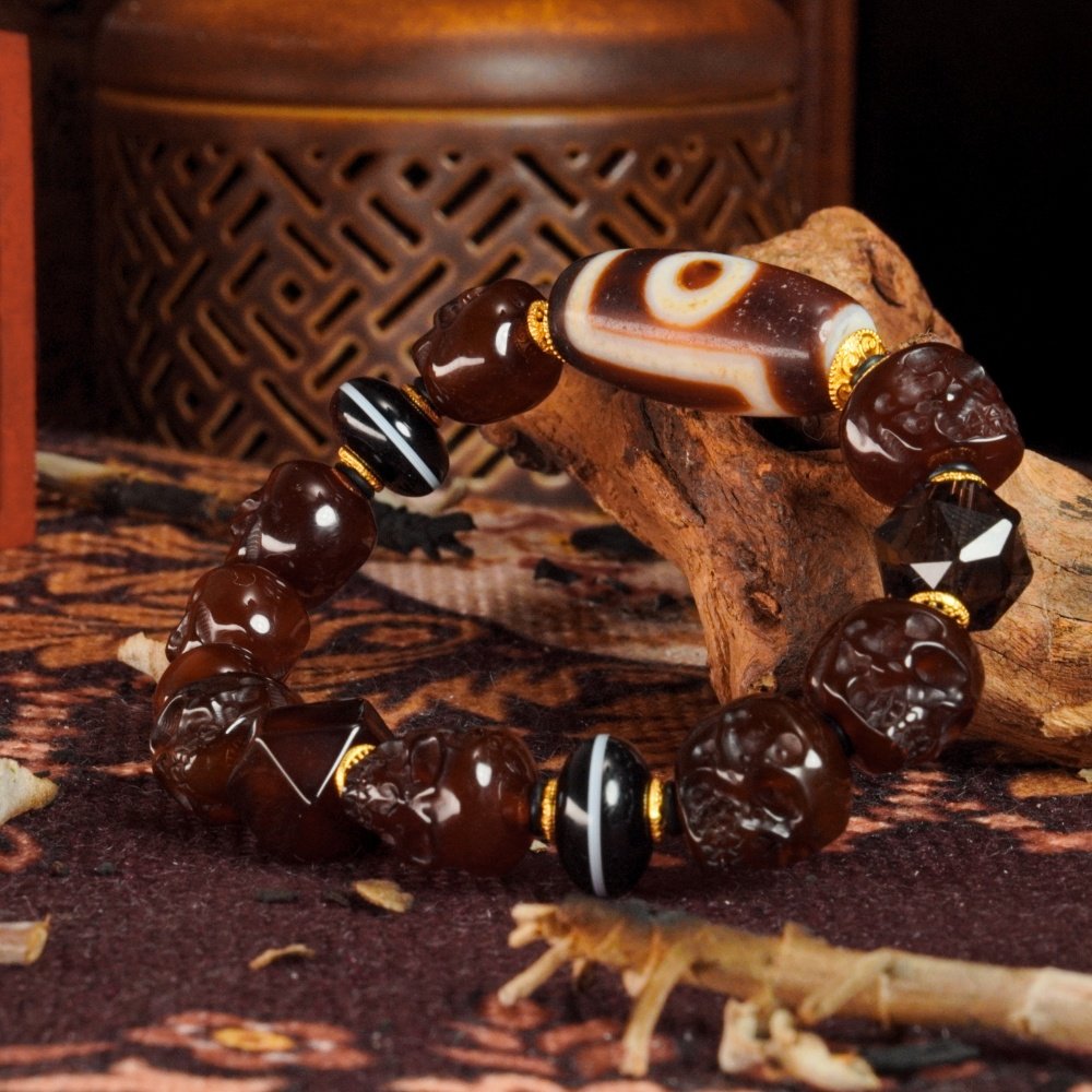Red Agate Skull & Dzi Bead Bracelet – Protection, Power & Spiritual Awakening