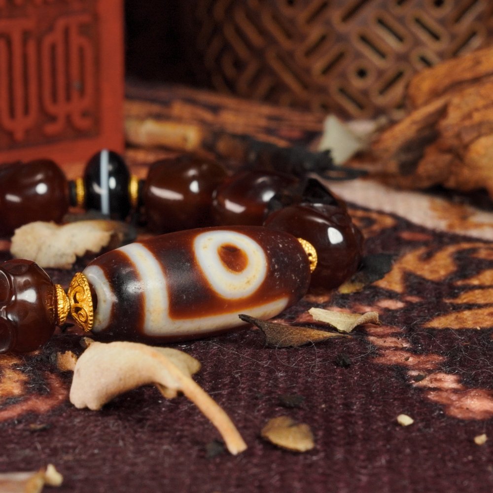 Red Agate Skull & Dzi Bead Bracelet – Protection, Power & Spiritual Awakening