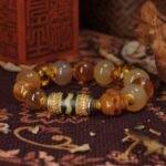 Golden Dzi & Agate Skull Bracelet – Wealth Flow & Inner Powe