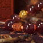 Strawberry Quartz & Golden Rutilated Skull Bracelet – Love, Wealth & Protection