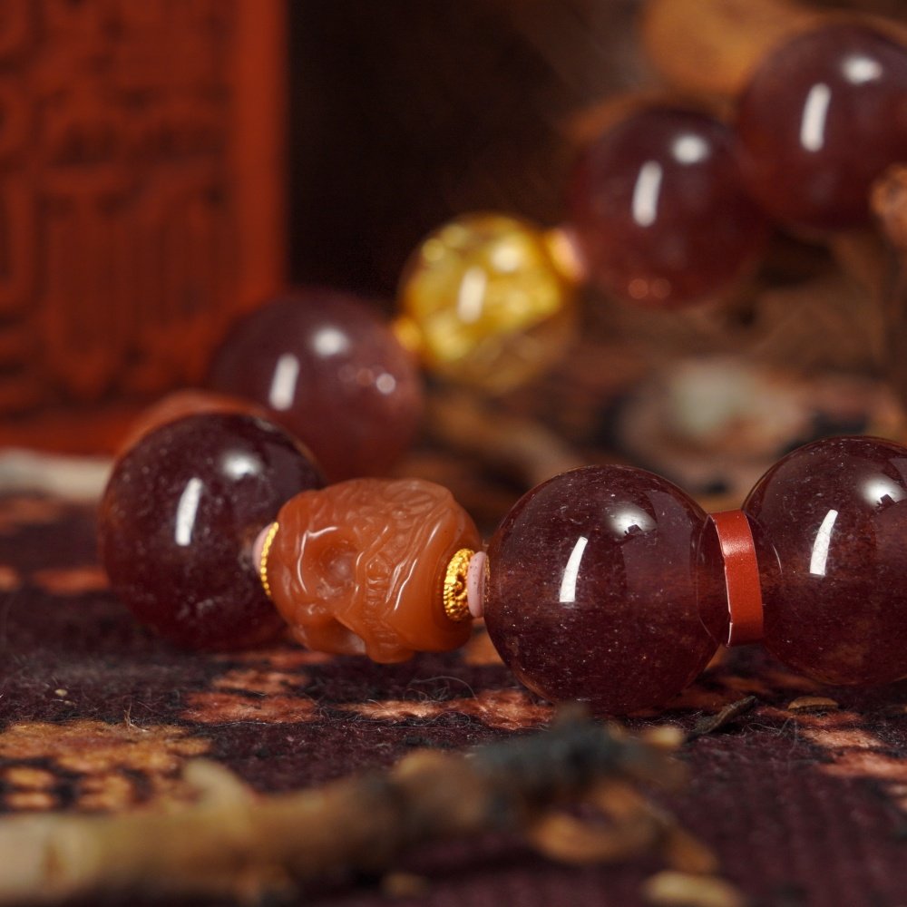 Strawberry Quartz & Golden Rutilated Skull Bracelet – Love, Wealth & Protection